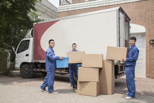 Removal team loading furniture for a UK house move