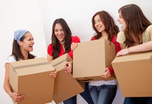 Local team handling sofa and furniture pick-up on a Hampstead street