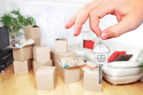 Professional movers handling office furniture in Hampstead