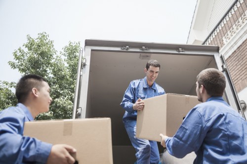 Careful loading of household items for a Hampstead relocation