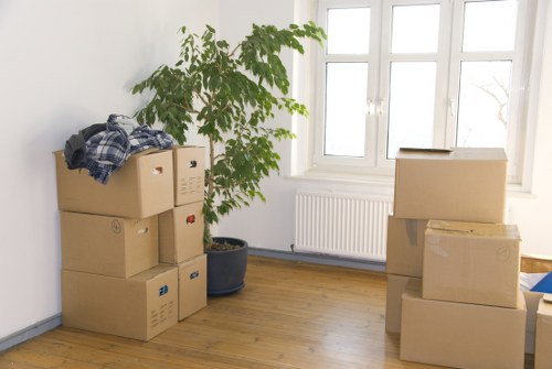Business relocation team preparing desks and IT equipment for a Hampstead office move
