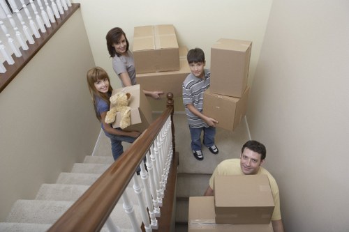 Professional movers loading belongings near a Hampstead property